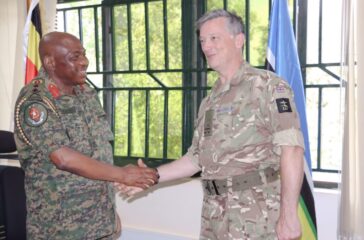 Maj-Gen-Jack-Bakasumba-shakes-hands-with-Brig-Olly-Bryant-Head-British-Defence-staff-EastAfrica