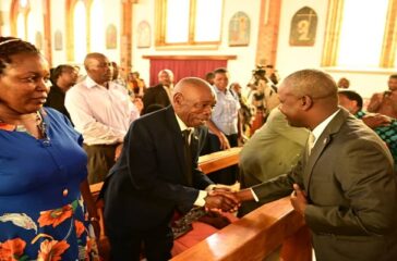 Deputy Speaker Thomas Tayebwa greets family members of the late Archbishop Paul Bakyenga