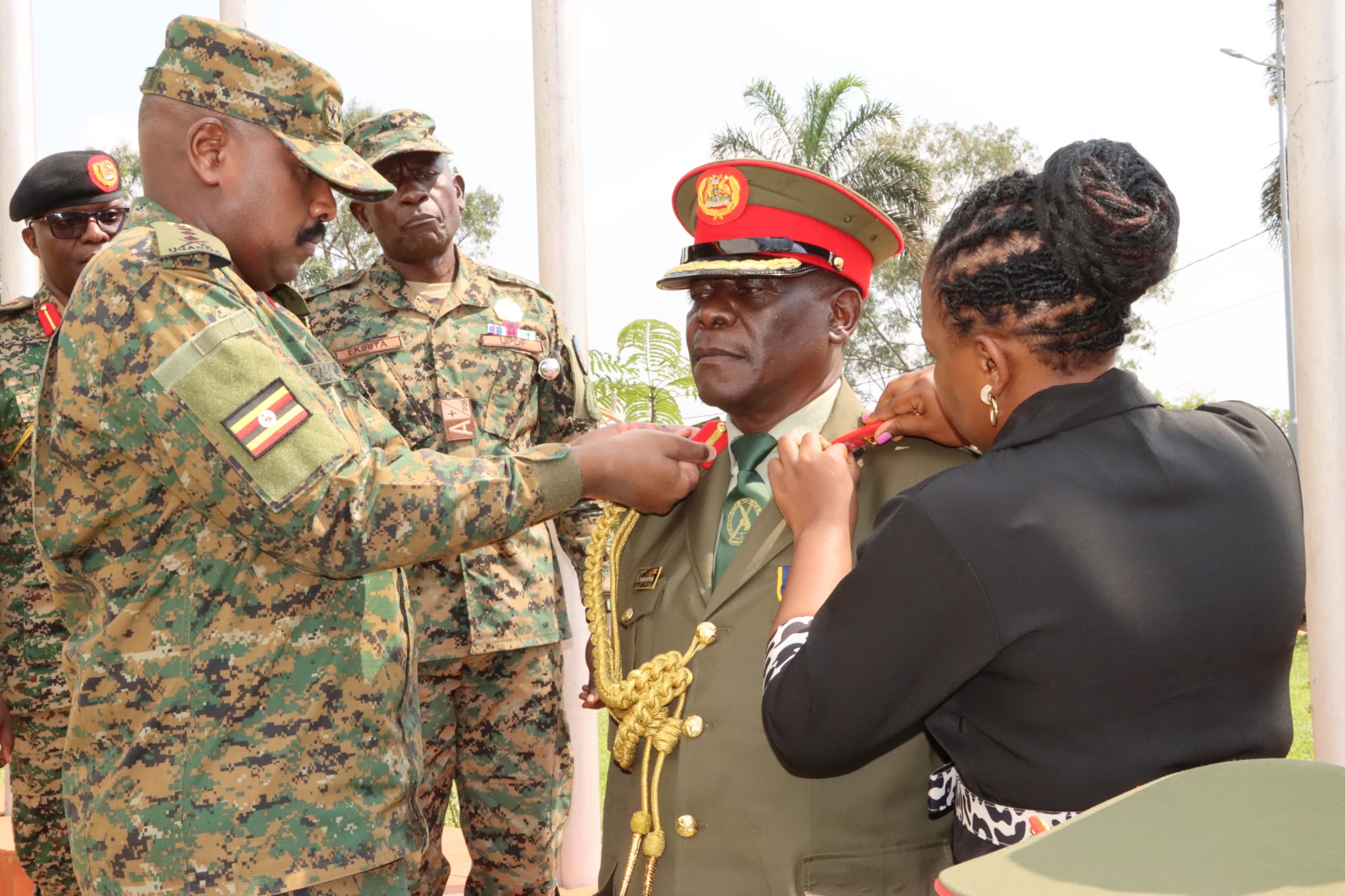 Gen-Kaneirugaba-decorating-Brig-Gen-Wilberforce-K-Serunkuma-during-the-ceremony-at-MoDVA-HQs-Mbuya