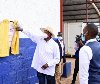 President Museveni commissioning Royal Milk Factory in Nalukolongo on Wednesday as the compoany MD Swaleh Kigoye (R) looks on. PPU Photo