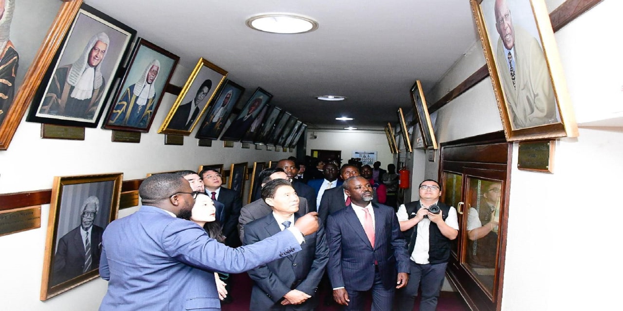 Tayebwa in corridor of honour with Chinese delegation RESIZED