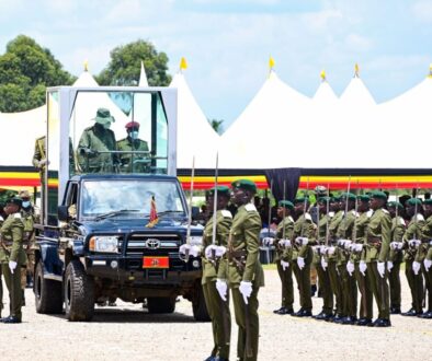 President-Museveni-watches-a-military-parade-by-cadet-officers-during-their-passout-at-the-Uganda-Military-Academy-in-Kabamba-on-Tuesday.-PPU-Photokabamba20-scaled