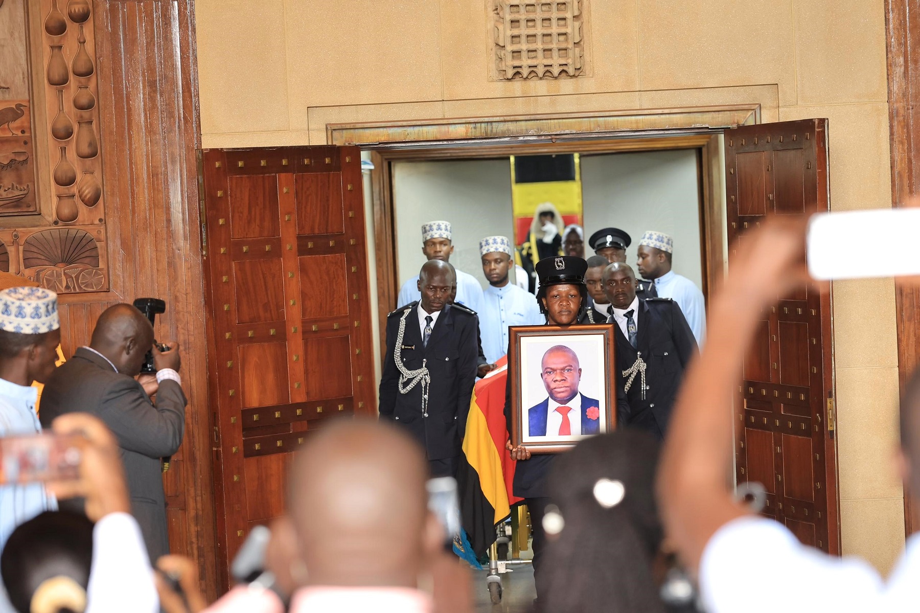 Hon. Ssegirinya wheeled out of Chamber RESIZED