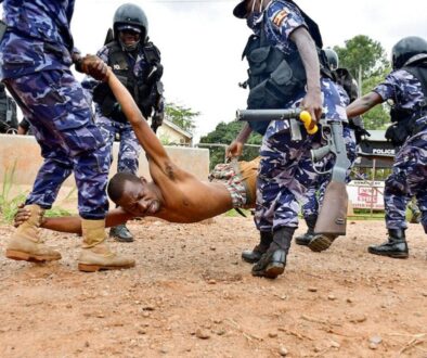 Police-1200px-detain-a-protestor-in-Luuka