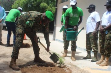 LT.-GEN-SAM-KAVUMA-FORCE-COMND-PLANTING-A-TREE-scaled-2560x1280