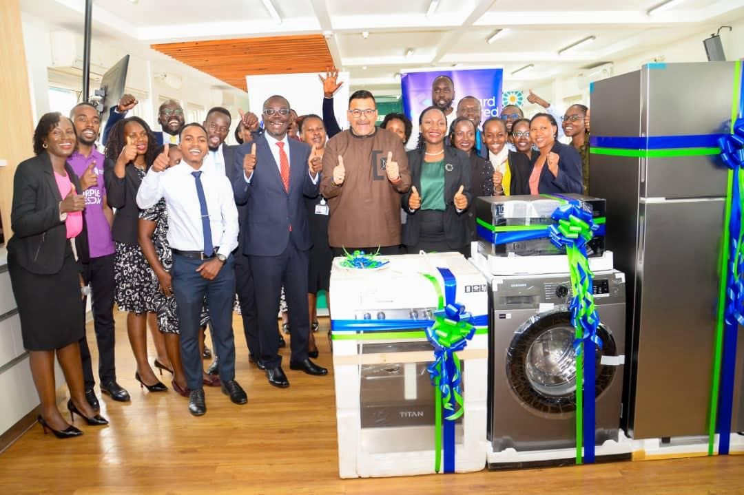 Group photo of Standard Chartered Staff led by the CEO Sanjay Rughani during the launch 2