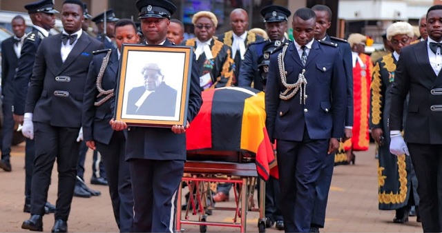 late-Justice-George-Wilson-Kanyeihamba-being-wheeled-at-the-judiciary-head-quarter late-Justice-George-Wilson-Kanyeihamba-being-wheeled-at-the-judiciary-head-quarter
