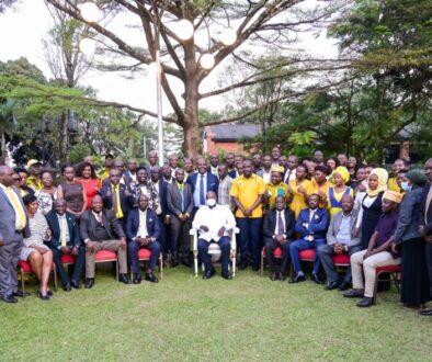 President Museveni poses for a photo with a group of Ugandans from the Diaspora after a meeting at Nakasero on Tuesday. PPU Photo.