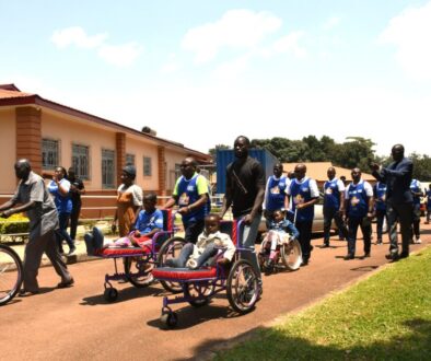Some of the hospital staff and partners walking alongside some the children treated at the CoRSU Hospital