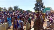 UPDF distributes impounded charcoal to women