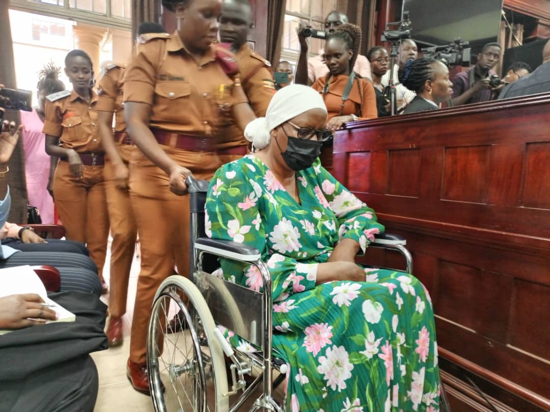 mollu katanga being pushed on wheel chair