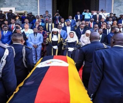 The Speaker, her deputy, the LOP and other MPs receive the casket containing the body of Nakimuli