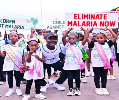 Deputy Speaker Tayebwa (in black cap) with children who took part in the walk