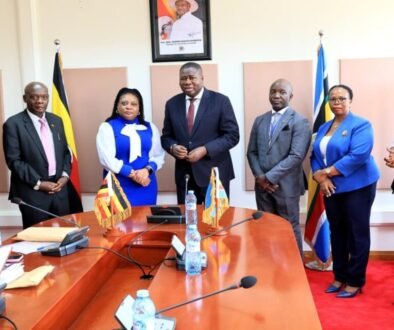 Oboth (C) with officials from the tribunal after their meeting 