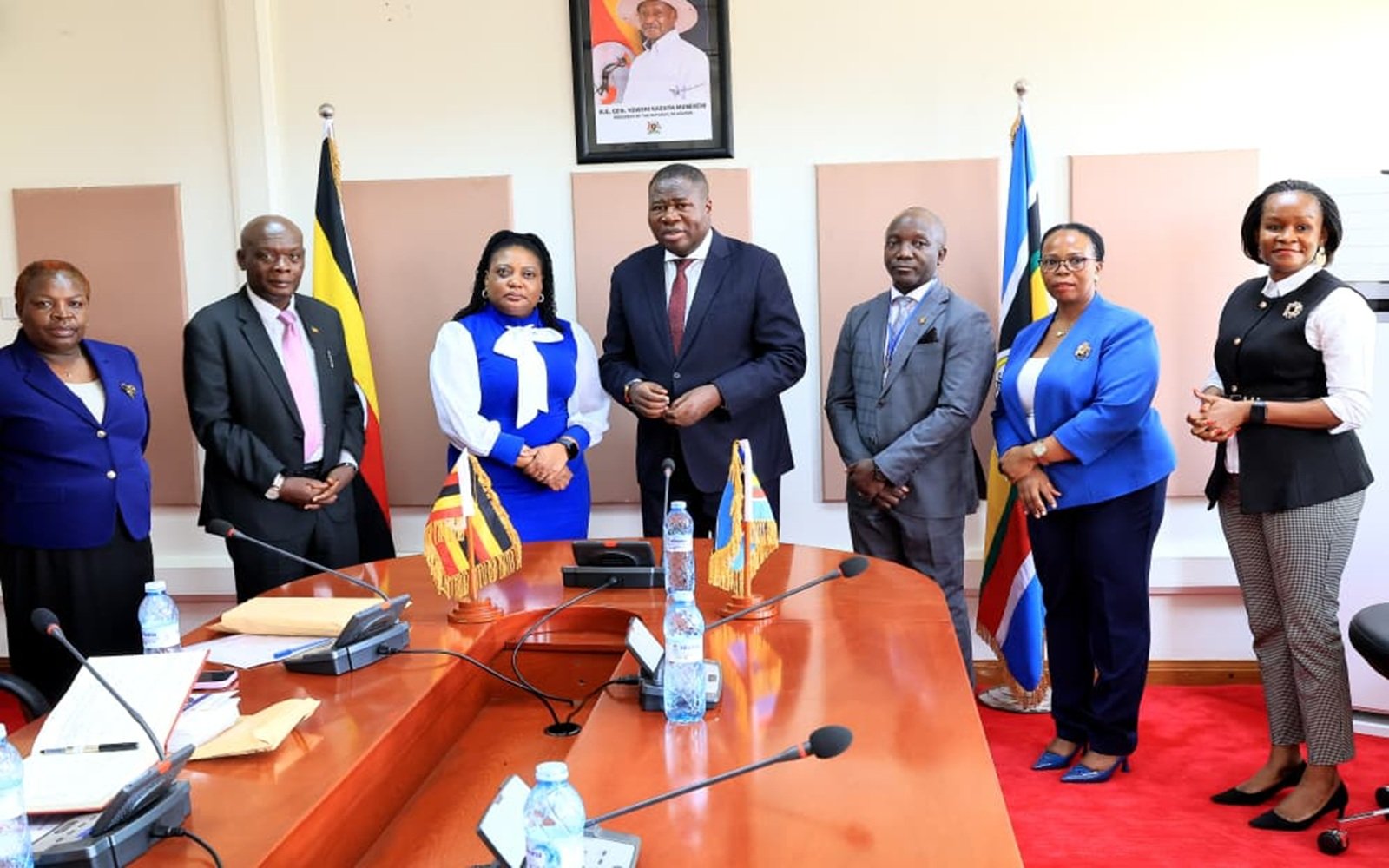 Oboth (C) with officials from the tribunal after their meeting 