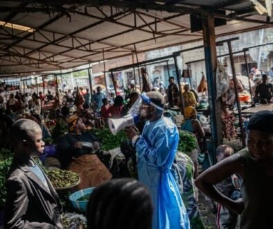 A local leader wearing protective gear raises awareness about the Ebola outbreak in Goma (AFP or licensors)