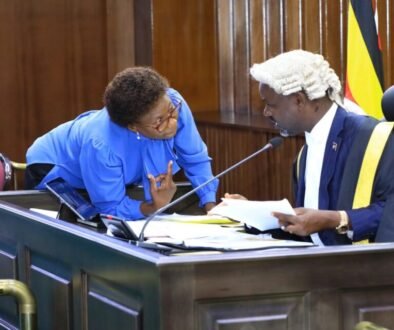 Deputy Speaker Tayebwa (R) confers with the Government Chief Whip, Hon. Jane Ruth Aceng