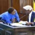 Deputy Speaker Tayebwa (R) confers with the Government Chief Whip, Hon. Jane Ruth Aceng
