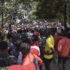 Burundian nationals gather outside their embassy to apply for border passes as they prepare to travel back to their country following the Kenyan governmen