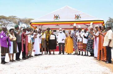 President Museveni (C) poses for a photo with MPs and ministers from Karamoja sub region during the Karamoja Cultural Day celebrations held in Moroto Municipality on Wednesday. PPU Photo